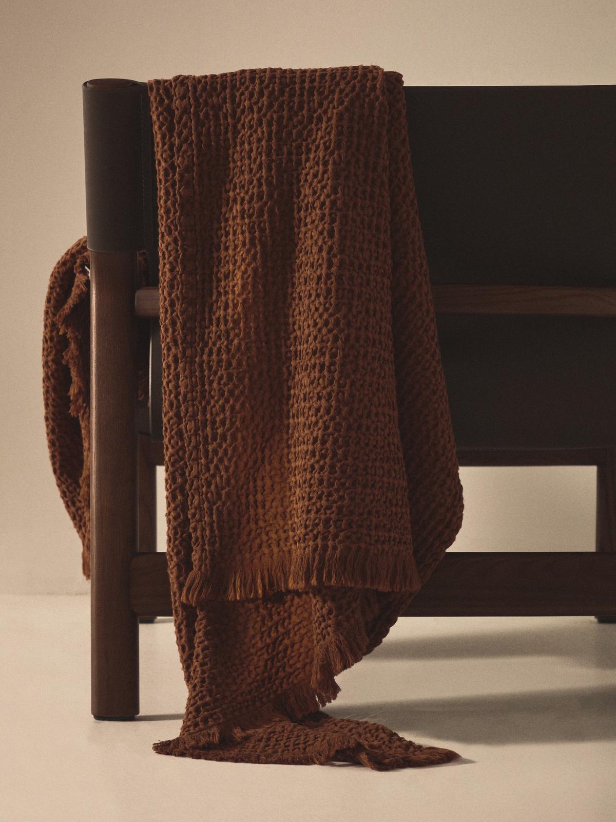 Nulina donkeroranje deken van 100% katoen met wafeldessin 130 x 170 cm