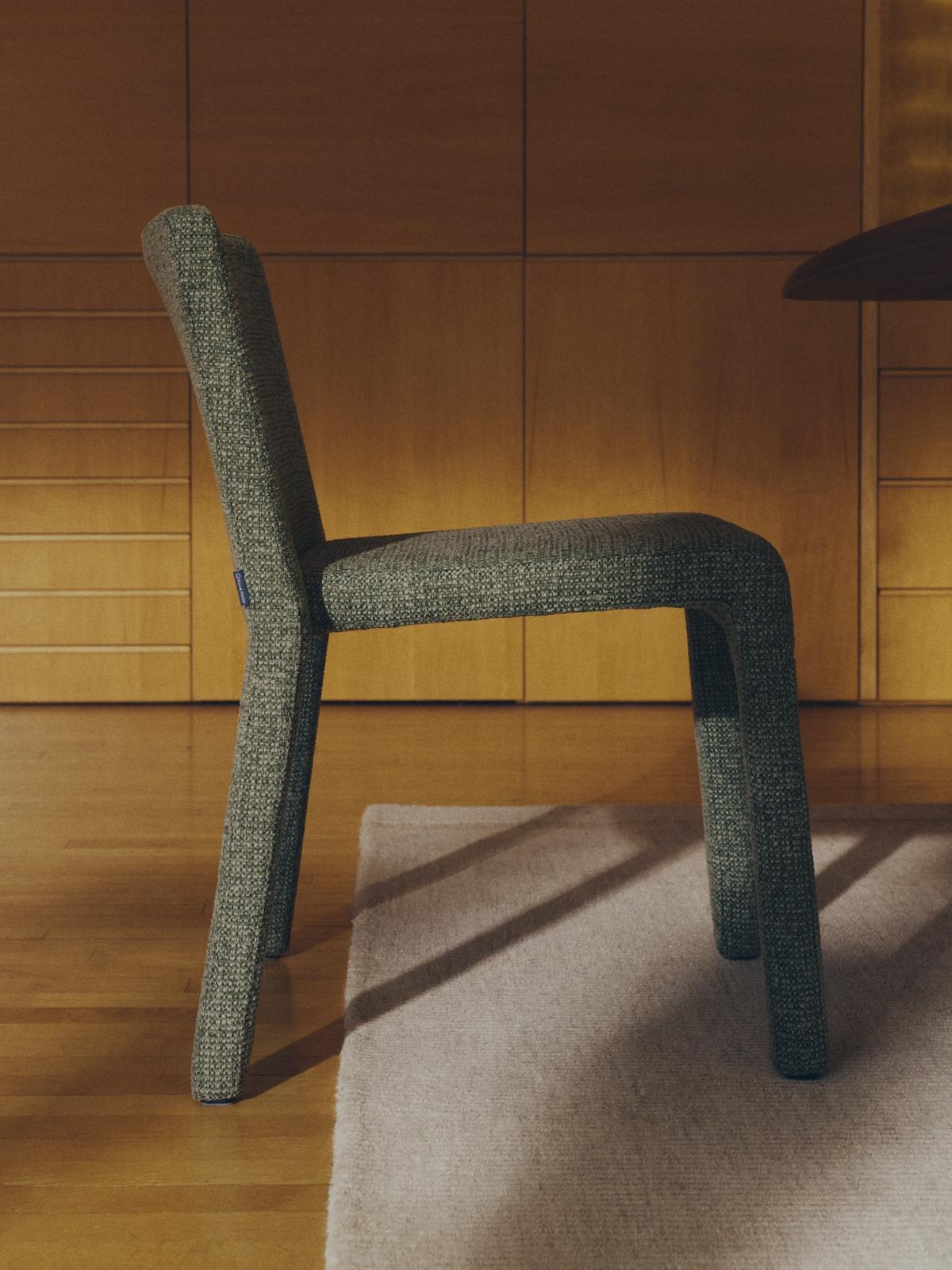 Loria stapelbare stoel in groen chenille